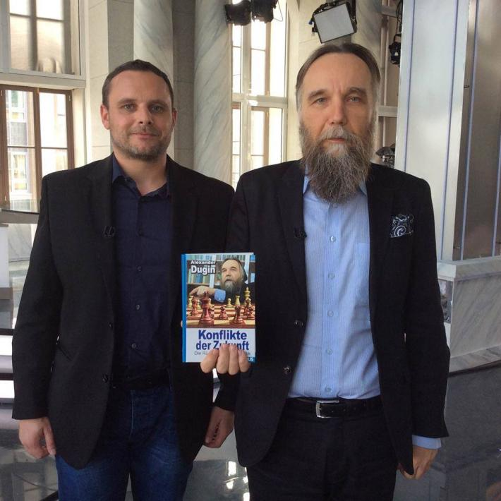 Gegen_die_AfD's tweet photo. @FoiaResearch Im Frühjahr 2016 meldeten Mateusz Piskorski,Manuel Ochsenreiter,Markus Frohnmaier,und weitere #AfD Politiker das Deutsche Zentrum für Eurasische Studien (GCES),beim Amtsgericht Berlin-Charlottenburg an. @KreuzAcht zu dieser Zeit Foto mit Neonazi Alexander Dugin #byebyeAfD #NoAfD https://t.co/ENli94uN1m