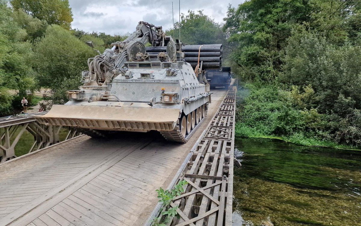ArmouredSapper's tweet photo. T3 is out the door for Ex IRON TITAN. π¦Ύ
Titan AVLB, Trojan AVRE, and Terrier AET crossing the River Avon on Salisbury Plain.
@thinkdefence may be pleased to see a bridge, on a bridge, on a bridge. π
πΈ Mick Holland (FB)
#ArmouredSappers #ArmouredEngineers #LiveMoveFight #T3 https://t.co/EtkYLUlJ7A
