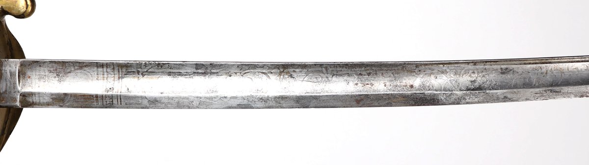 American civil war sword with polished heavily pierced brass handle and rewrapped grip. Single edged blade with slight curve and flat back, etching to the face near handle but is worn and hard to see. Size 36" L, blade 30" L#artifacts #history #art #homedecor #archaeology #museum