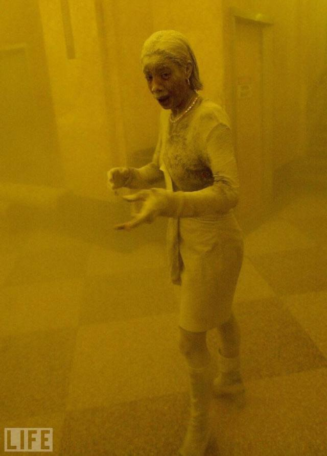 quirkquests's tweet photo. A frightened Marcy Borders, aged 28, covered in dust as she takes refuge after one of the towers collapsed on 9/11. 

She passed away because of stomach cancer at the age of 42. Her massive healthcare bills had left her penniless. Terrible. https://t.co/RHmpW5lw16