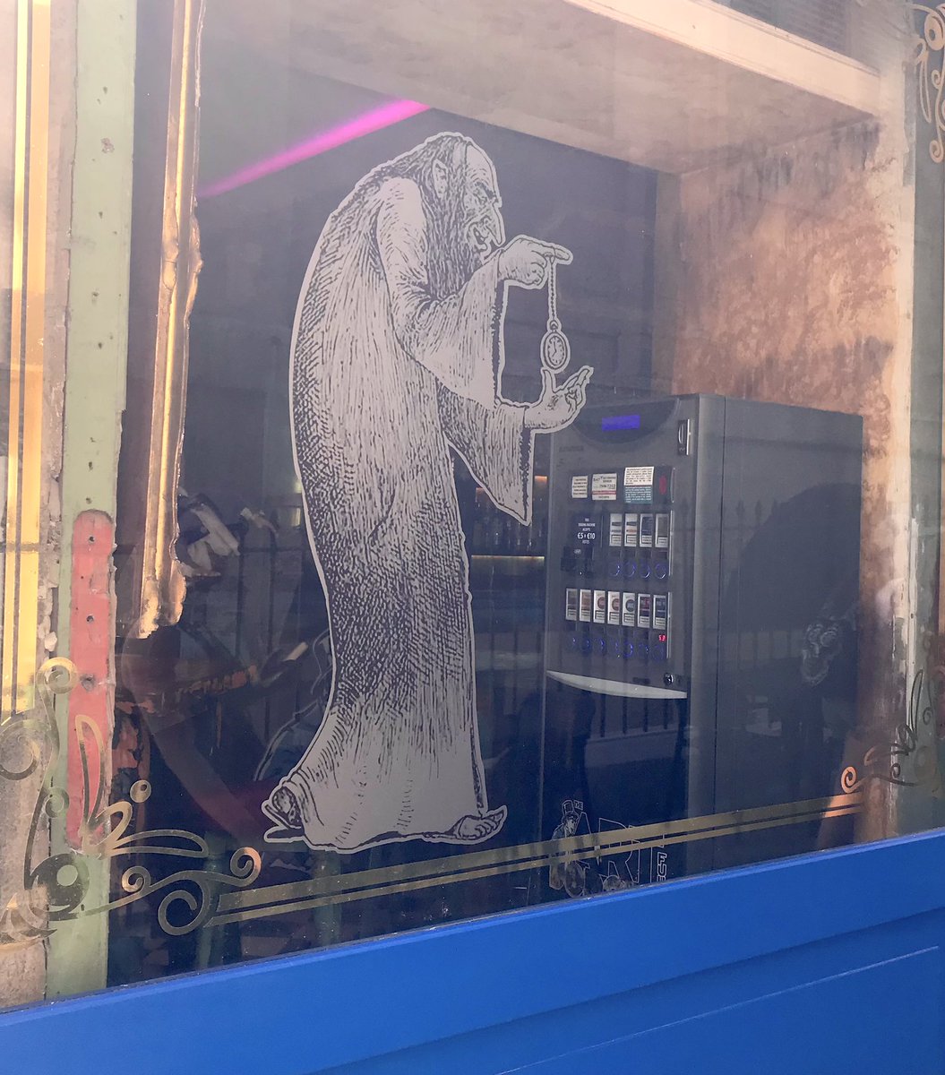 It might be a (hideously) accurate depiction from a novel, but this is a patently antisemitic cartoon in the window of The ARTfull Dodger in Valletta and should be removed