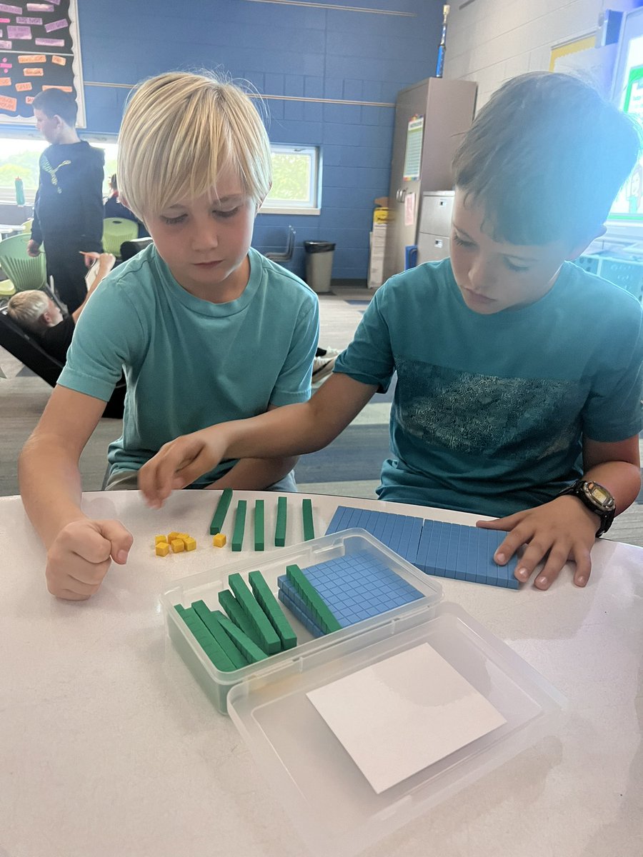 MrsWachholder's tweet photo. These @WCSWarhawks 4th graders are getting into the swing of things during math rotations. Ss were collaborating, exploring math tools, and continuing to build their knowledge of place value #wcsflight #mathrocks #friendsinfourth @Reed_Reads009 @missuhen https://t.co/MIkkJQTjqt