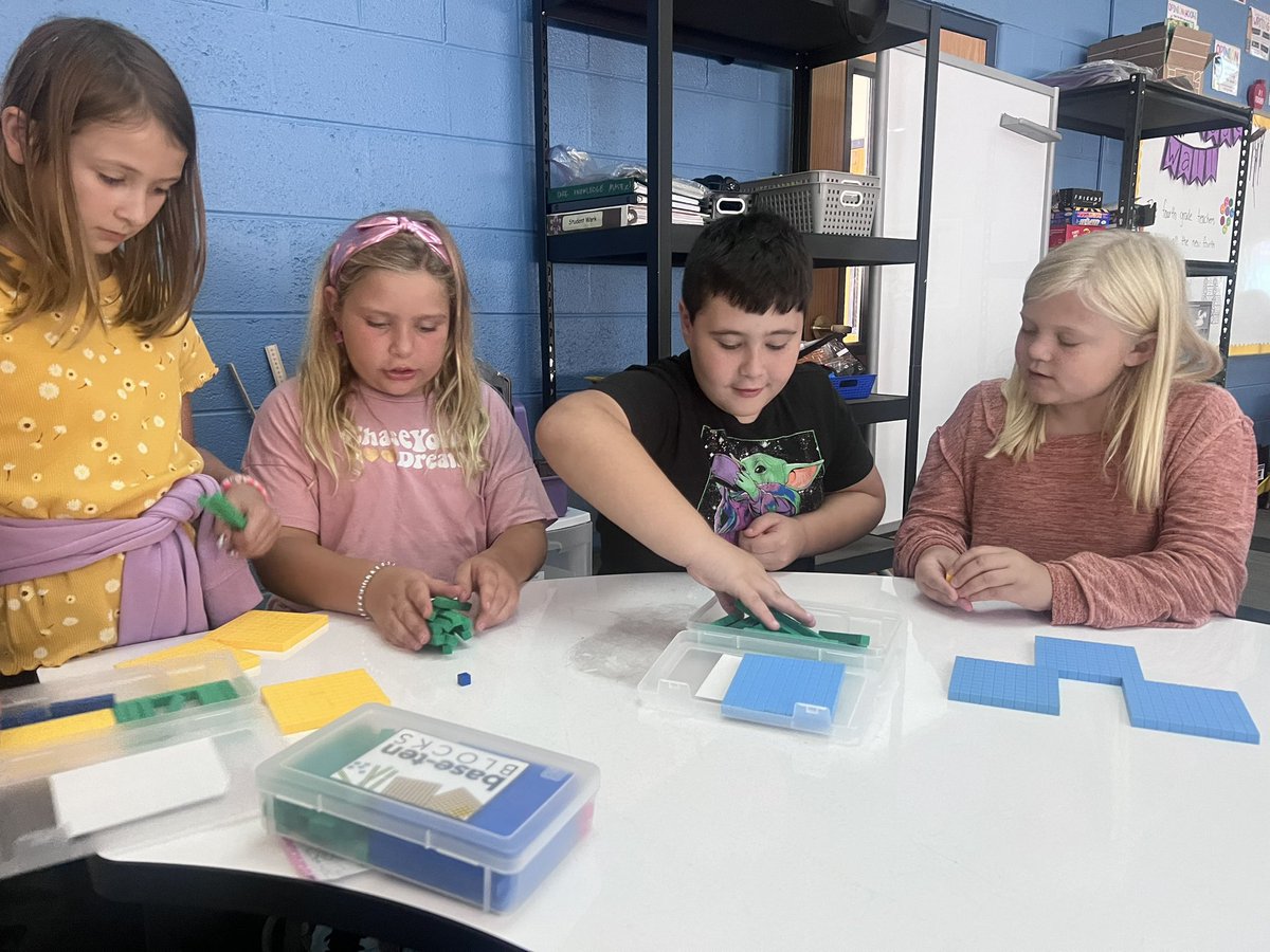 MrsWachholder's tweet photo. These @WCSWarhawks 4th graders are getting into the swing of things during math rotations. Ss were collaborating, exploring math tools, and continuing to build their knowledge of place value #wcsflight #mathrocks #friendsinfourth @Reed_Reads009 @missuhen https://t.co/MIkkJQTjqt