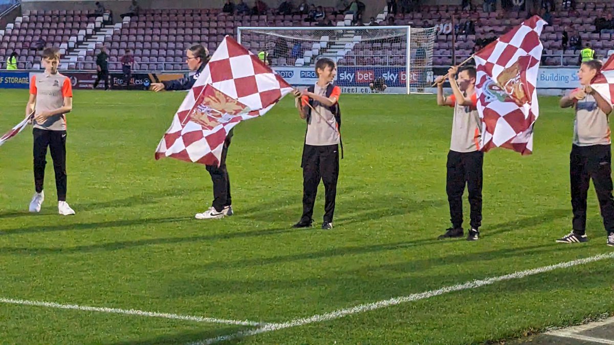 BlandCatherine's tweet photo. Leo and his football team @ntfc flying the flags and walking out with the players at tonight’s game. https://t.co/W3O7EtFpBz