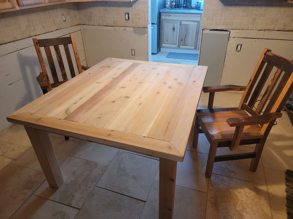 We have not had dinner at a normal table in 3 years. This weekend, we changed  that. I just finished a 1 1/2 inch solid cedar 46" x 54" dinner table. Our hickory chairs got a new friend !!