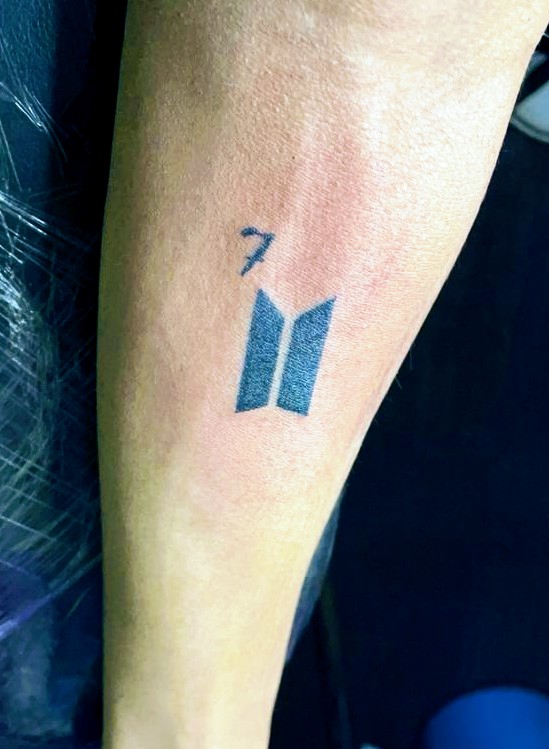 BTS heart tattoo located on the wrist.