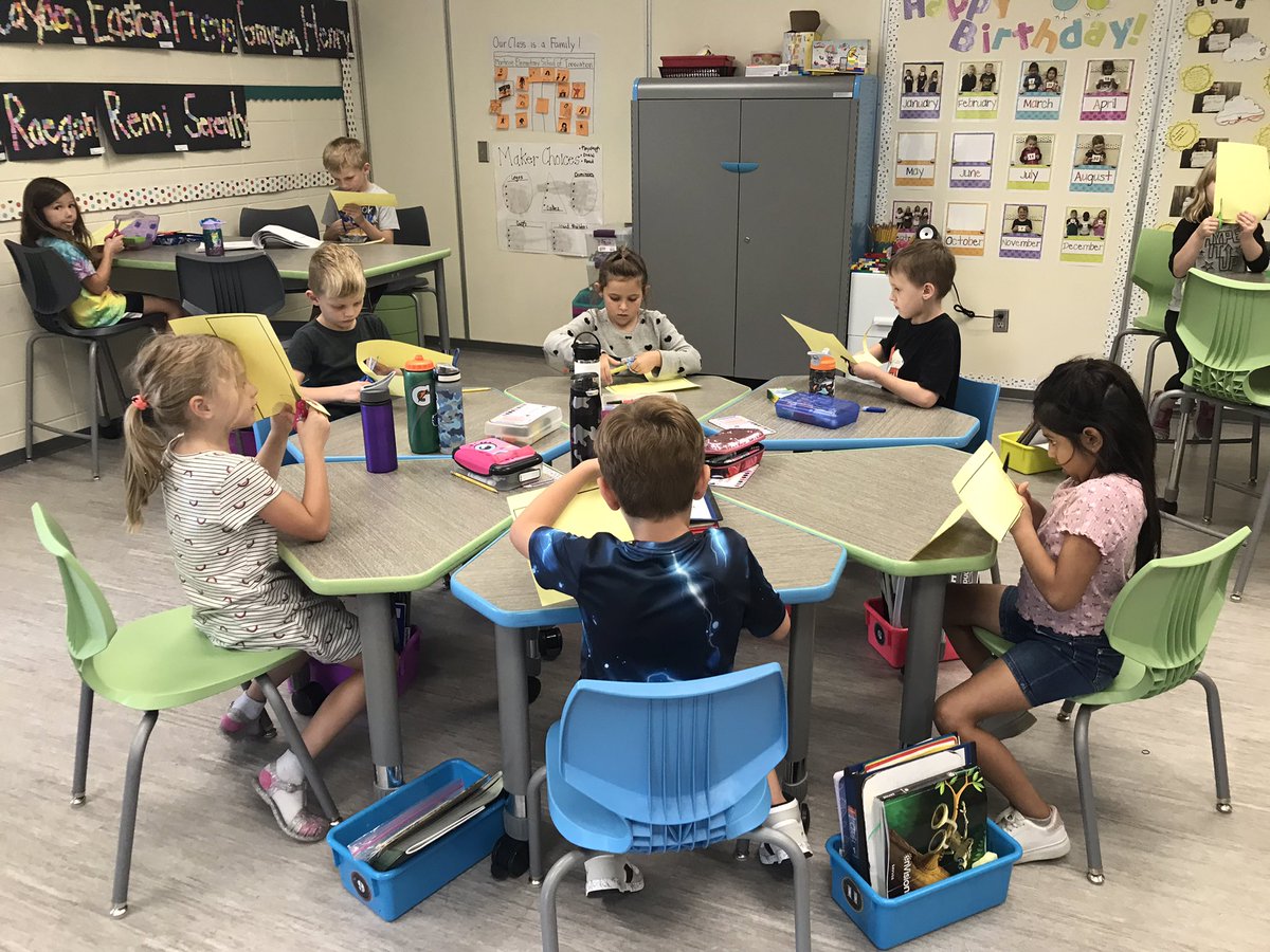 Cutting out our busses to strengthen our fine motor skills. #theMESway