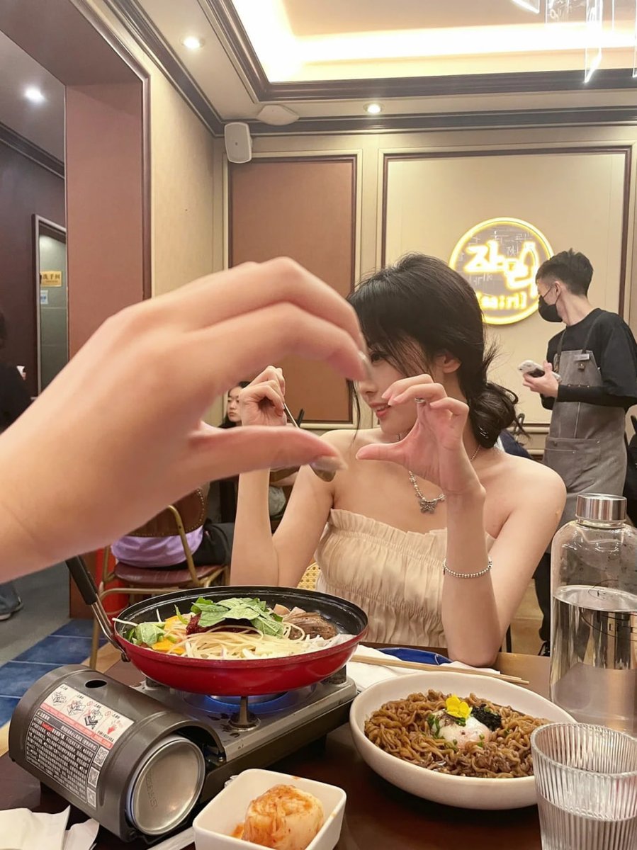 Make a heart gesture with your hands.❤️