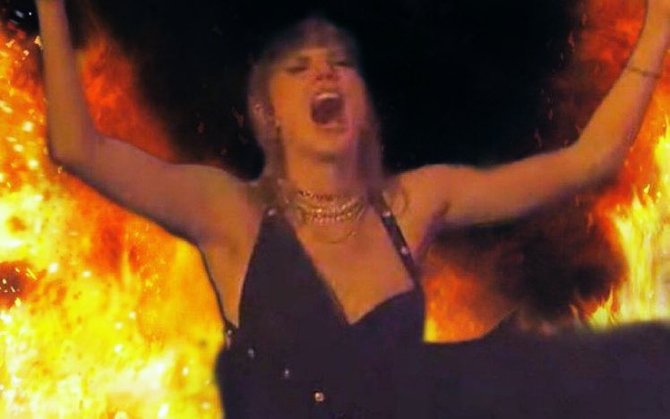 Taylor Swift at                       Swifties 
KC game with                        right 
Travis’ mom                            now