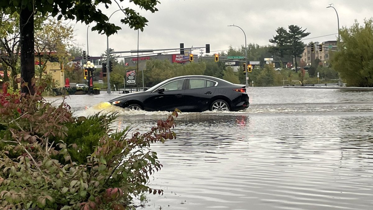 wdiowirt's tweet photo. DULUTH FLOODING: Take a look at what the intersection of Mall Drive and Maple Grove Road looks like. It’s completely underwater. https://t.co/G1ohwFq2mI