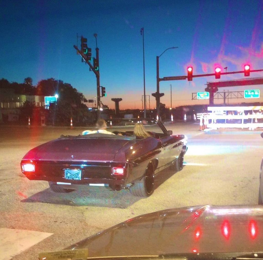 Taylor Swift and Travis Kelce getting away in his car following the Chiefs game.