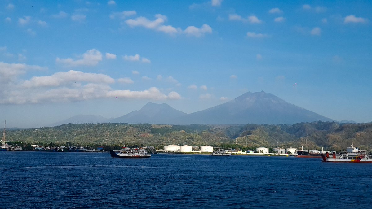 Raung and Merapi volcano in East Java as seen from a ferry enroute Gilimanuk, Bali.