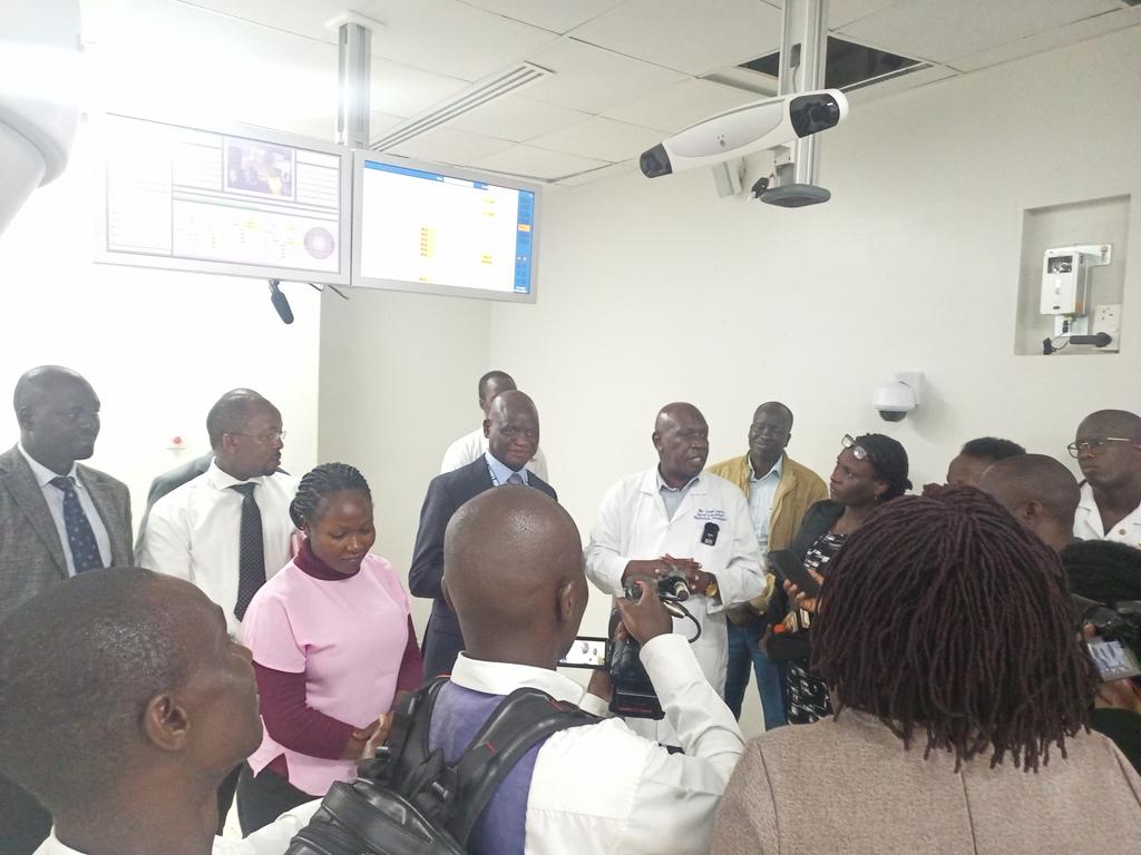 UgandaCancerIns's tweet photo. Addressing journalists this morning, Dr @JacksonOrem and a team of clinicians unveil new treatment modalities on the newly installed true beam linear accelerators. The machines started operations today with each able to treat 90patients a day. 
#FightCancerUg https://t.co/AcmCN2t0mF