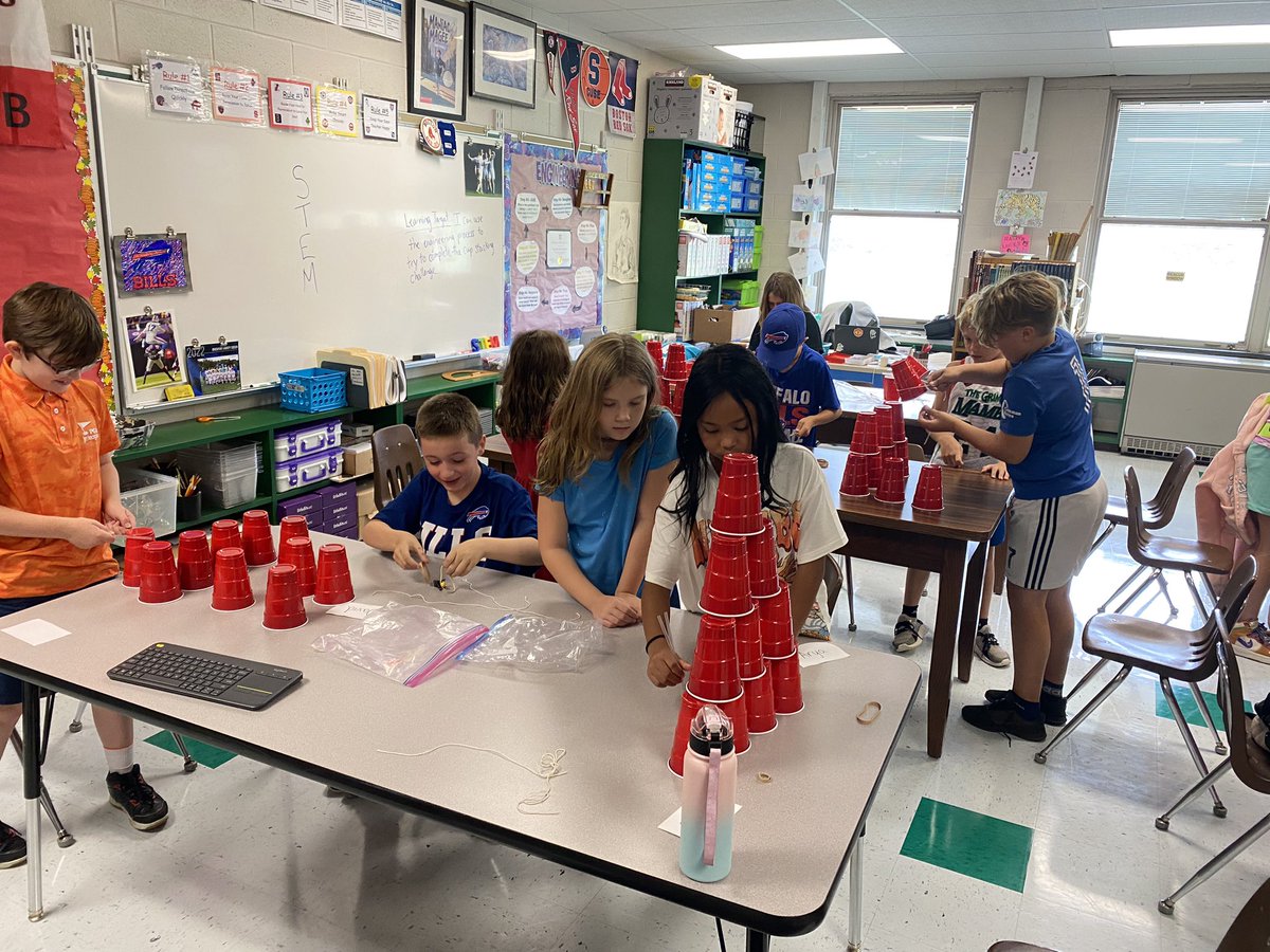 Mr. Alvut’s class taking on the cup stacking challenge in day #2 of 4th grade STEM… student groups had to figure out how stack pyramids without using hands… they could only use string, straws and rubber bands!