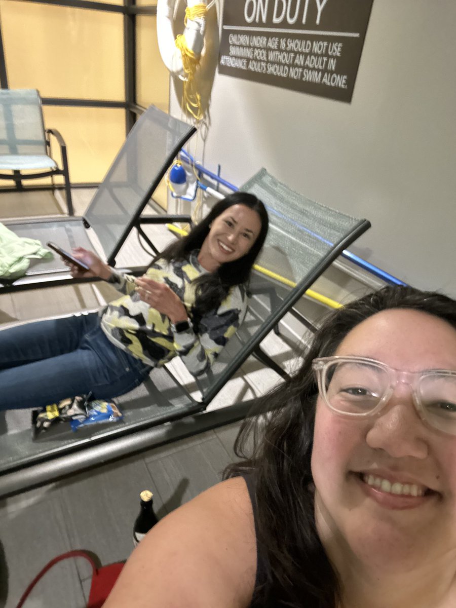 Proof that <a href="/alyssamikiko/">Alyssa Mikiko</a> and I can have fun anywhere you put us… finishing the leftover sake from yesterdays consumer event last night at the indoor pool of the Renaissance Inn, Watertown MA