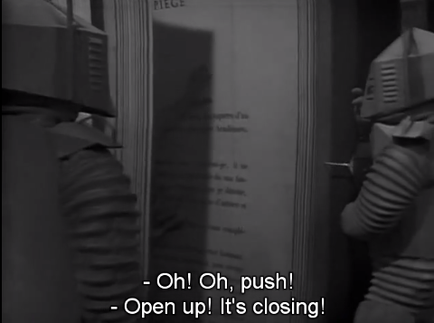 DWUDatabase's tweet photo. The cliffhanger is Jamie and Zoe literally being pressed into the text of a book. With a cliffhanger like that how could I not have been hooked on this show? #DoctorWho #MindRobber https://t.co/FdDaj9r5tH