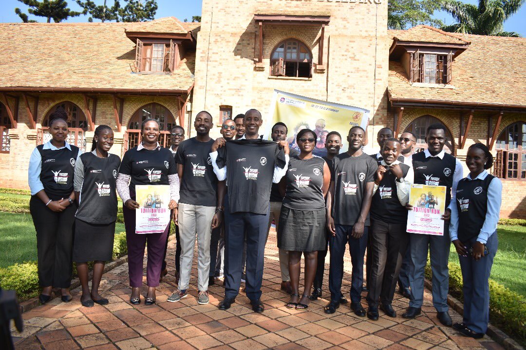theucuguild's tweet photo. This afternoon, we were pleased to have our  VC ,Prof. Aaron Mushengyenzi launch  the #UCUGuildRun Kit.

The essence of this run is to raise tuition for students who are having difficulties in paying tuition.

The shirt  &amp; vest go for Shs.30,000 and Shs.20,000 respectively. https://t.co/o6xePBDWNV