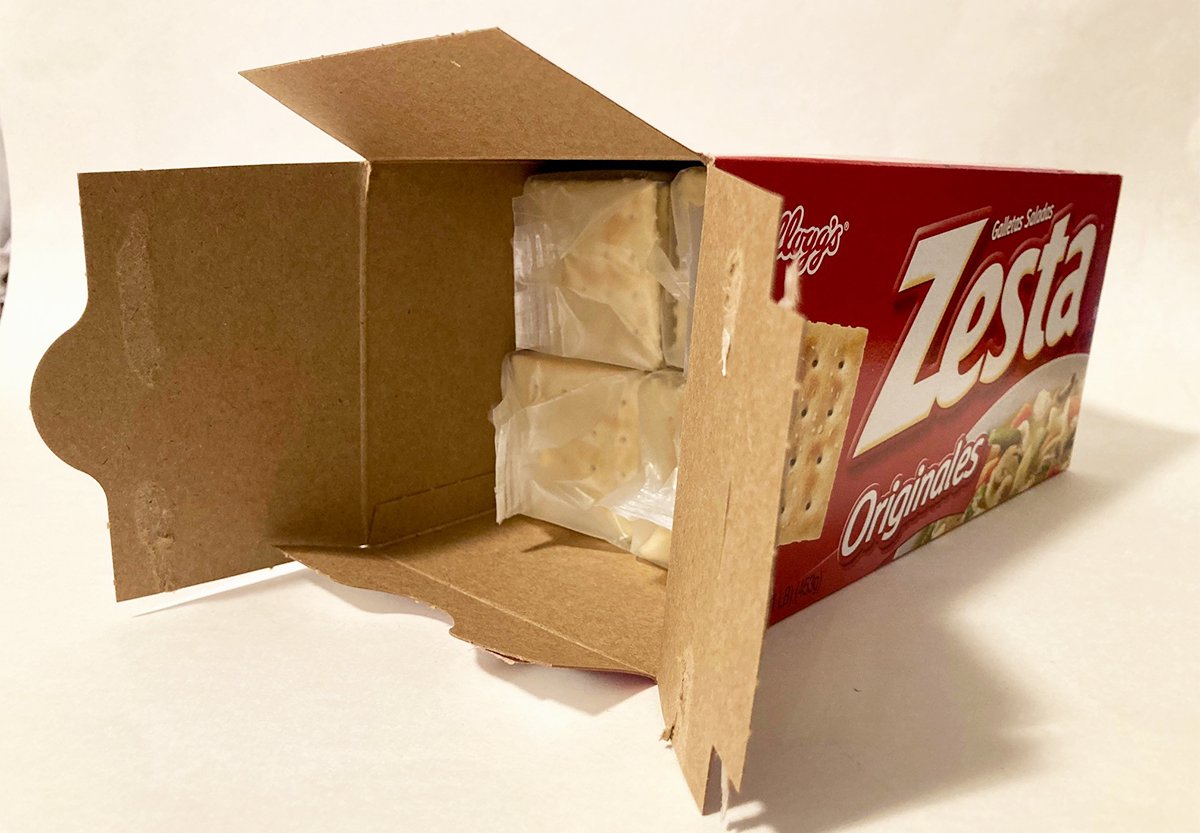 PackmanRick's tweet image. Kellogg’s Zesta crackers: too much #packaging or too little product? Box has 2-plus inches of excessive headspace #packagingfail #shrinkflation