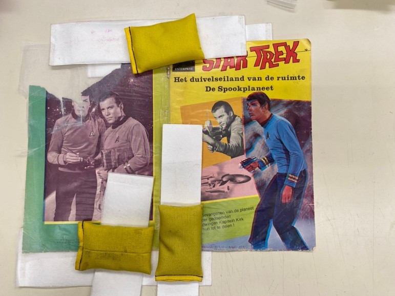 librarycongress's tweet photo. It's National Comic Book Day! Did you know the Library has one of the nation's largest collections of comic books? Unlike the heroes depicted on their pages, not all of the volumes are in great shape. Here's how Library Technicians care for the collection. https://t.co/rkunPWpe8q https://t.co/fdUgMVvJGX