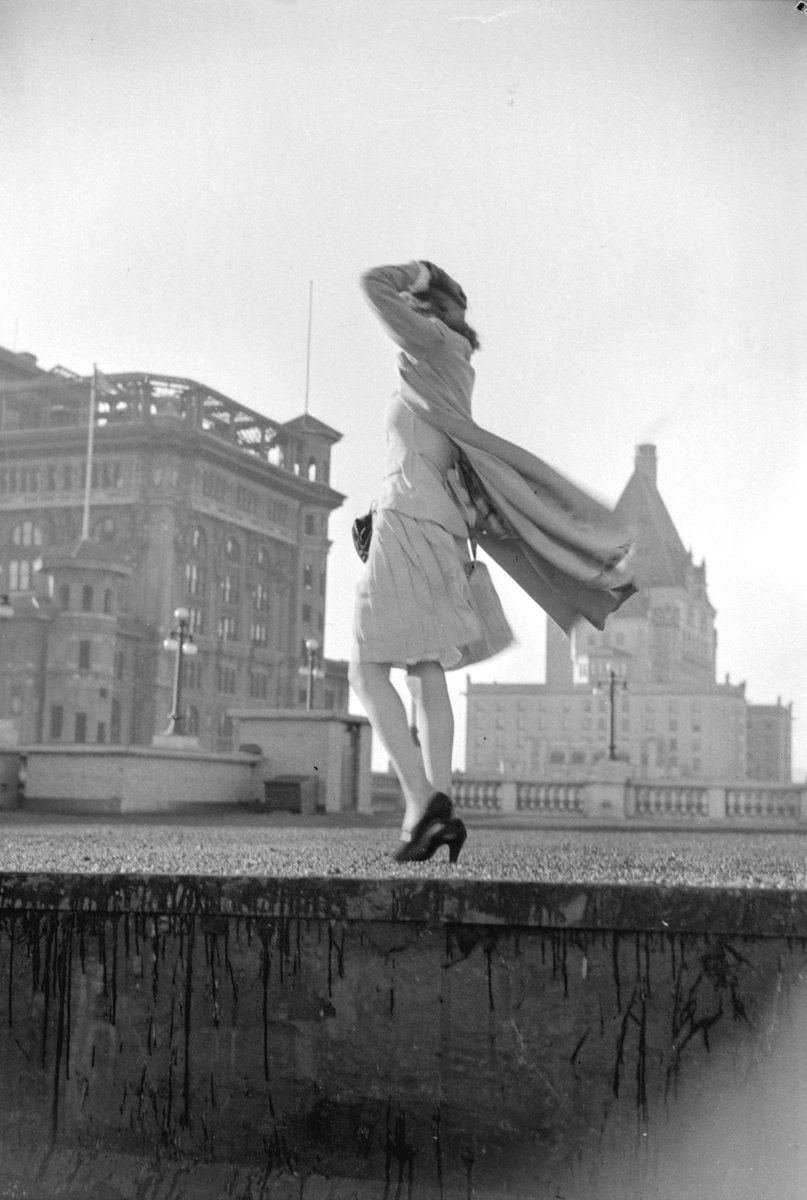 Marie Moreau, the <a href="/VancouverSun/">The Vancouver Sun</a> fashion editor, is photographed by Jack Lindsay on the roof of the HBC store in 1942. Image courtesy of <a href="/VanArchives/">Vancouver Archives</a>.