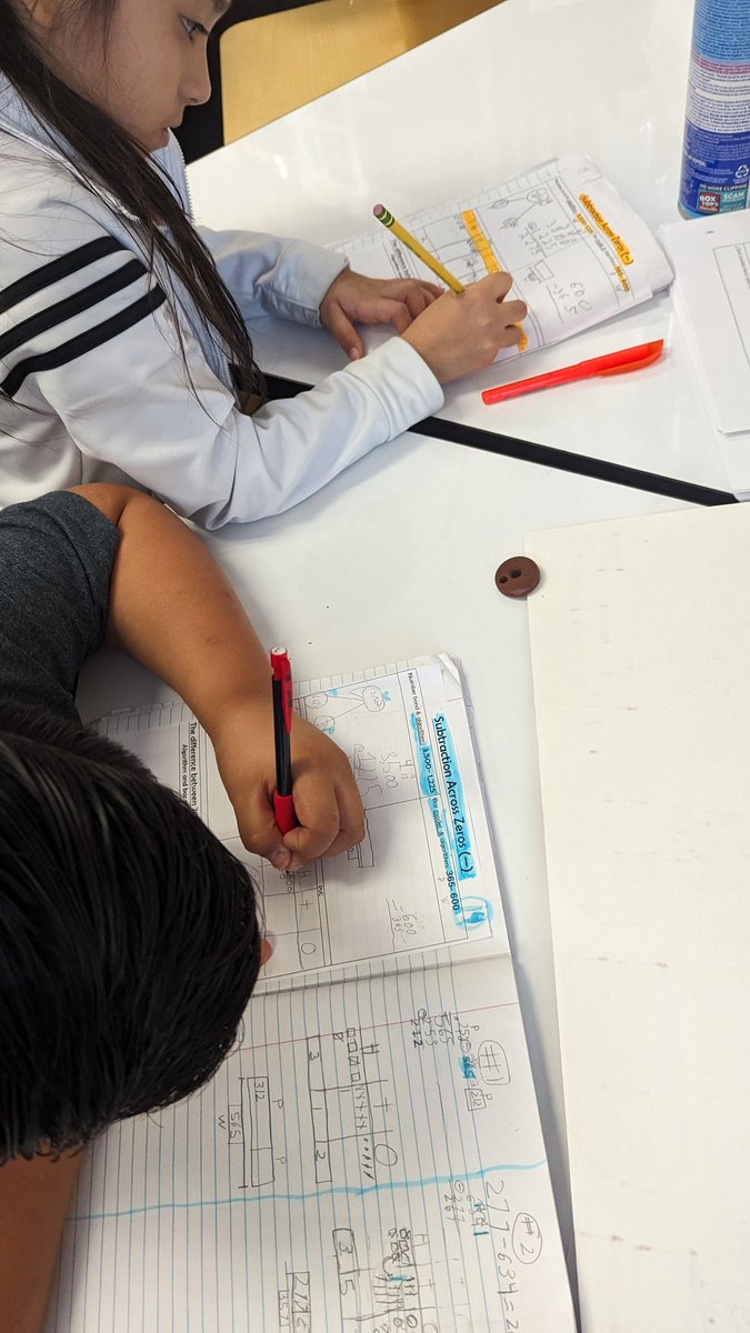 J_Vazquez_3's tweet photo. Subtraction across zeros #partnerwork #languagepartners #welovemath @Horn_Dream_Big @AliefISD https://t.co/siDAbZvMJB