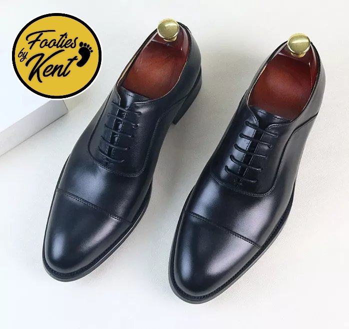 'Excellent fit, great quality'. Our classic cap toe oxford is specially made with full calf leather. It's a classic formal, look, with smooth lines and a rounded toe. Formal oxfords are perfect for work and special occasions. Price: ₦22,000