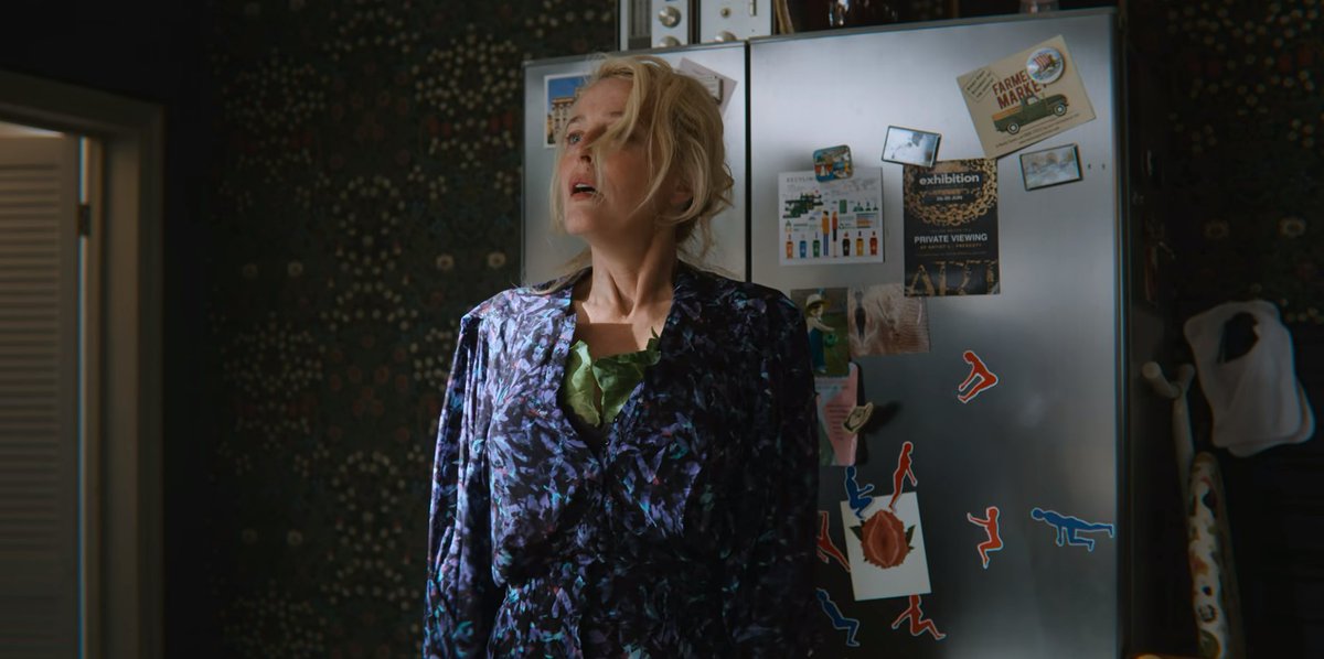 vagina_museum's tweet photo. What's that on Jean Milburn's fridge? Let's zoom and enhance...

Oooh! It's one of our vulva peony postcards! #SexEducation https://t.co/wu2MLtZuNG