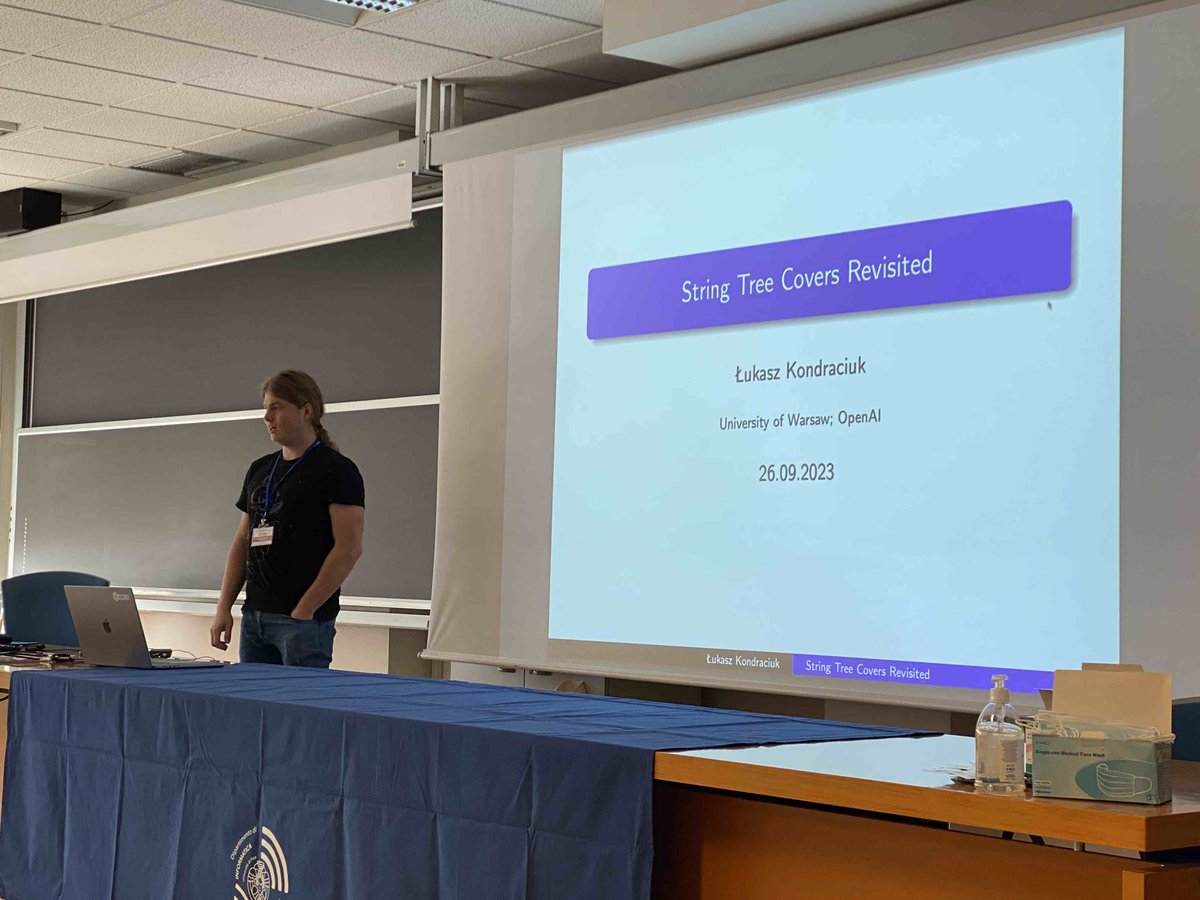 Łukasz Kondraciuk is now presenting "String Tree Covers Revisited." #SPIRE2023