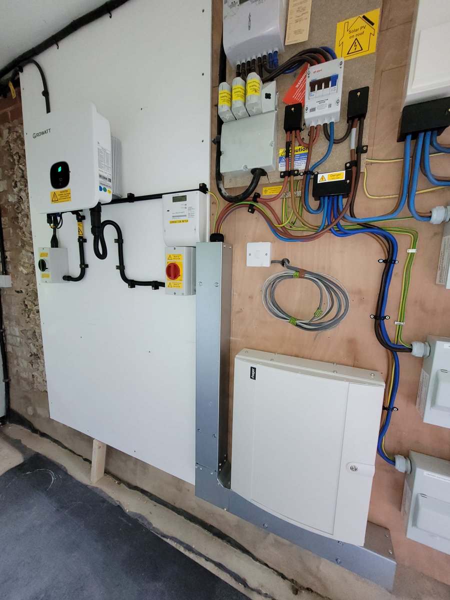 Replacement 3 phase PV inverter, solar PV generation meter and PV wiring installed due to fire damage at this property near #Newbury (house fire caused by faulty laptop power supply, not solar PV). Before and after photos.