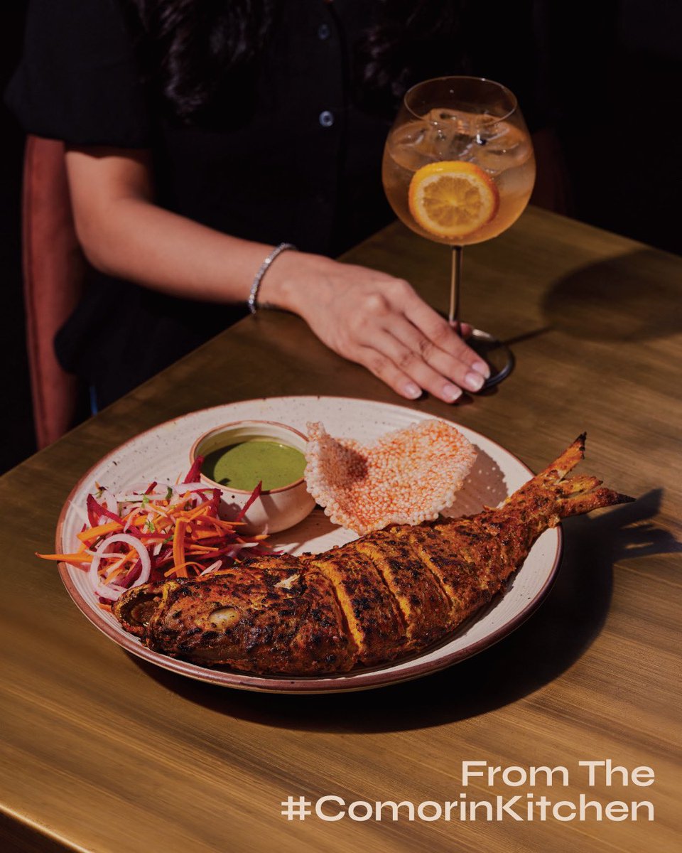 On our table today: vibrant colours, rich textures and aromatic flavours.
Seen here is our Tandoori Red Snapper being torched for the perfect bite. We serve this sharing plate with Mint Chutney and a refreshing Lachha Salad. 
.
.
.
#Comorin #ComeOnIn #Seafood #RegionalFlavours