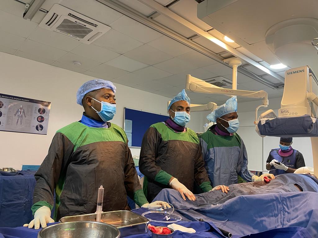 Here's another pictures from our trip to JKCI in Tanzania in July! Pictured here are Drs. Singh and Gandye and JKCI staff performing an ablation on a patient. #Tanzania #Africa #trainforward #madaktari #Cardiology