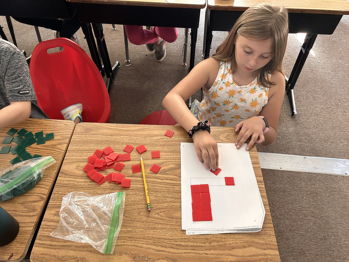 Today we used square tiles to find the area of different shapes! #WCconnects