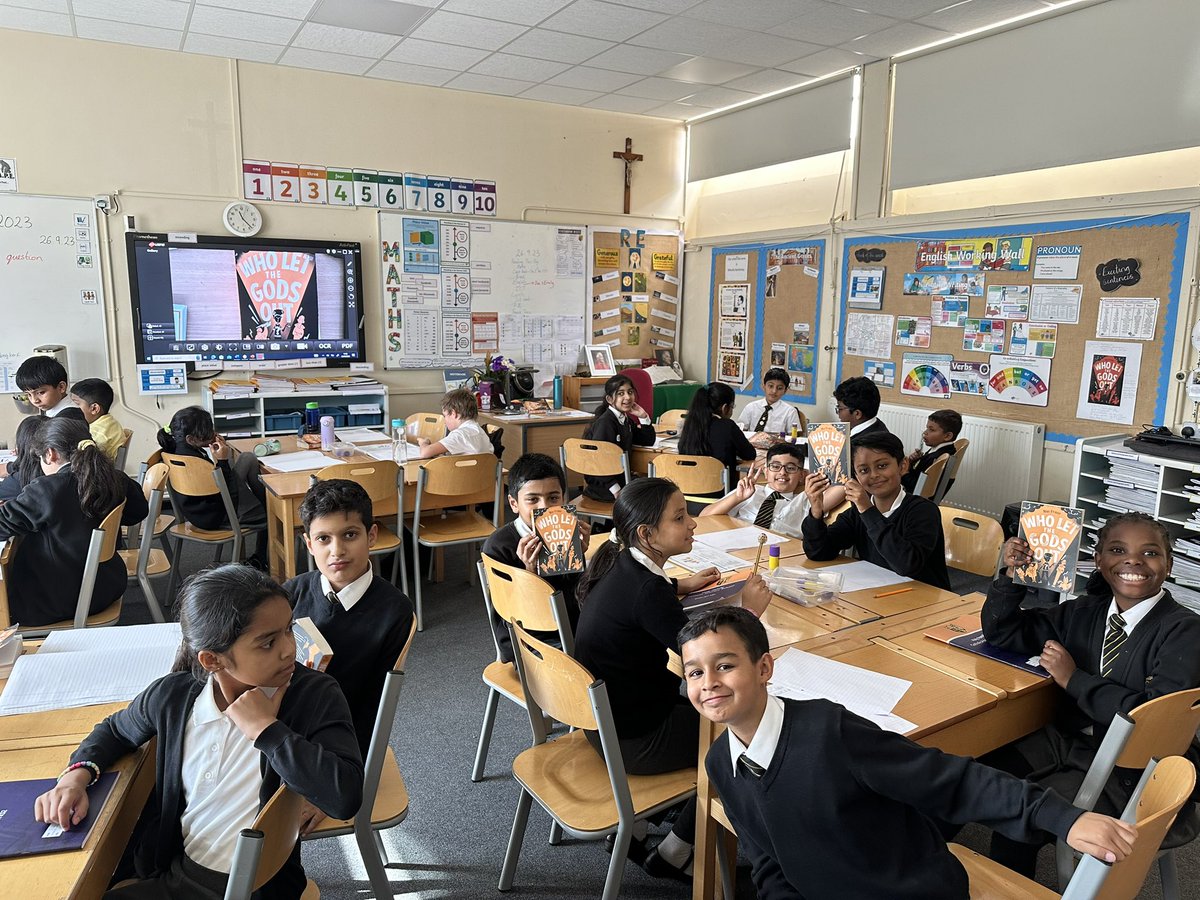 Y5 students engage in reading, delving deep into the details of Maz Evans' 'Who Let the Gods Out'. From discussing the characters to unraveling the complexities of the plot. Exploring the world of gods and mortals with enthusiasm and curiosity using evidence to explain answers.