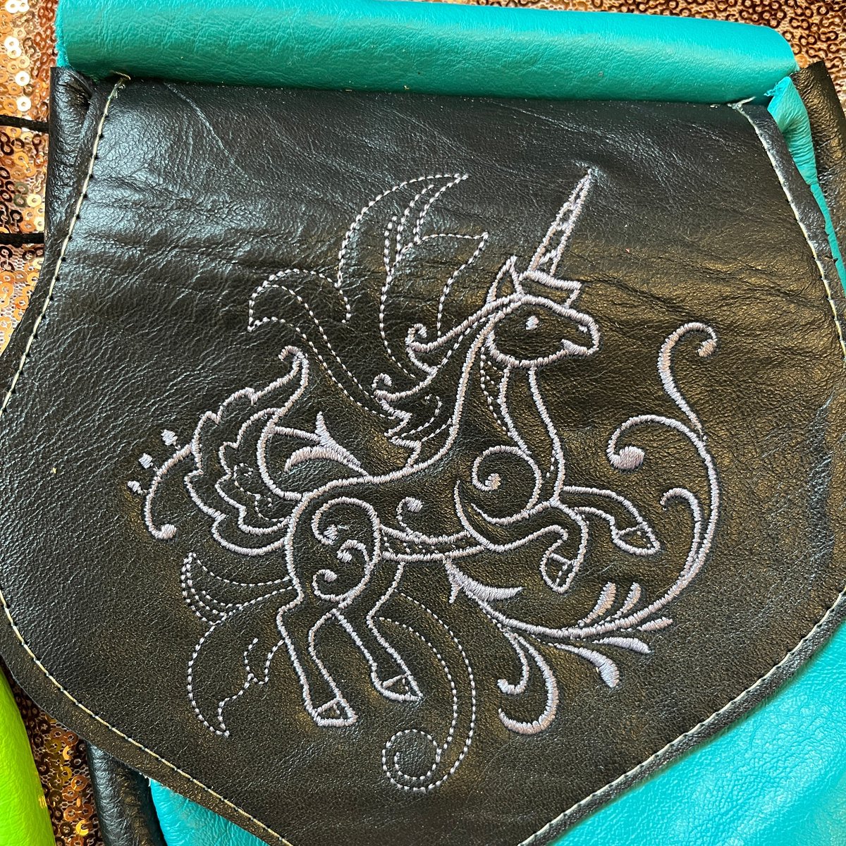 Wayward_Leather's tweet photo. Embroidery on leather? No problem! Not for us, anyway. Here are just a few of our many, MANY embroidery pattern options on belt bags. (We do customs, too!) #waywardleatherdesign #beltbag #larp 0#renfaire https://t.co/dYBBRinU1r