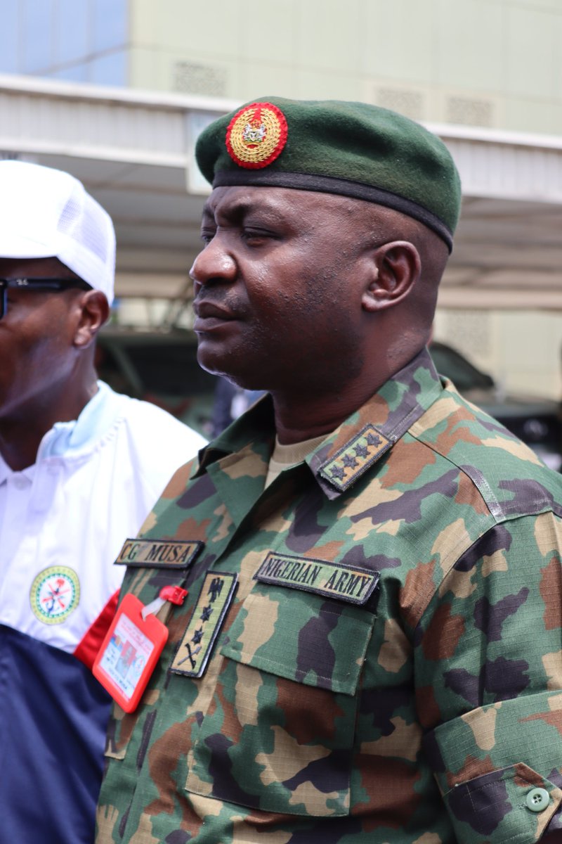 The General at the Organisation Of Military Sports In Africa Handing Over Of The Africa Military Games Trophy, Flag and Torch of Unity.