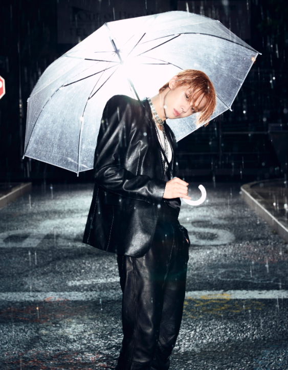 AboutMusicYT's tweet photo. Yeonjun from TXT is dazzling under the rain for their album. https://t.co/e4WMBPTtEO