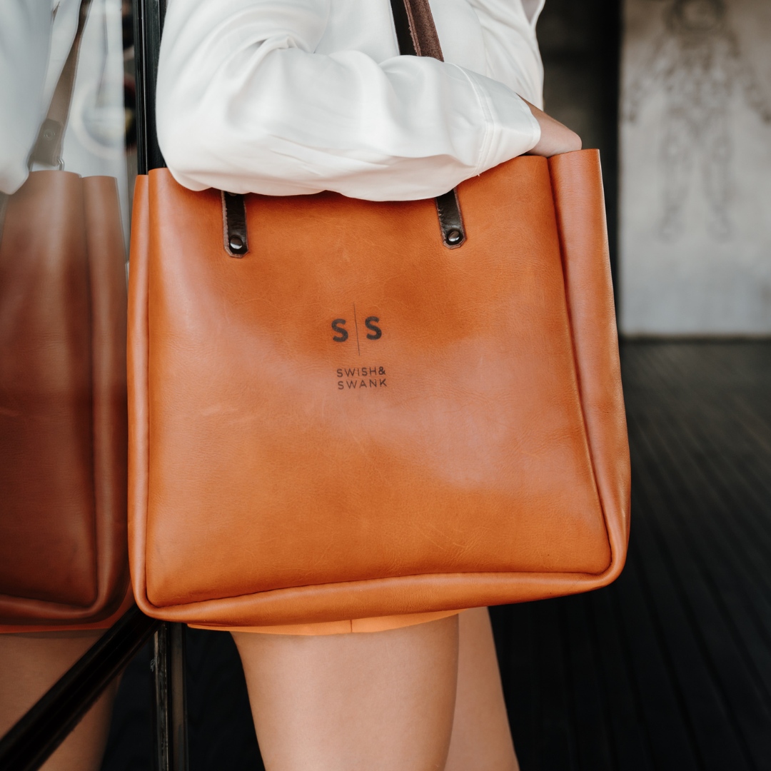 swish_swank's tweet photo. Carry style and sophistication wherever you go with this timeless Eve 2.1 leather tote bag. The perfect blend of fashion and function.

Take advantage of our spring SALE. Discount on all tan goods for the month of September.

#leathertote #versatilebag #handmade #certifiedforlife https://t.co/ID55IIB0NK