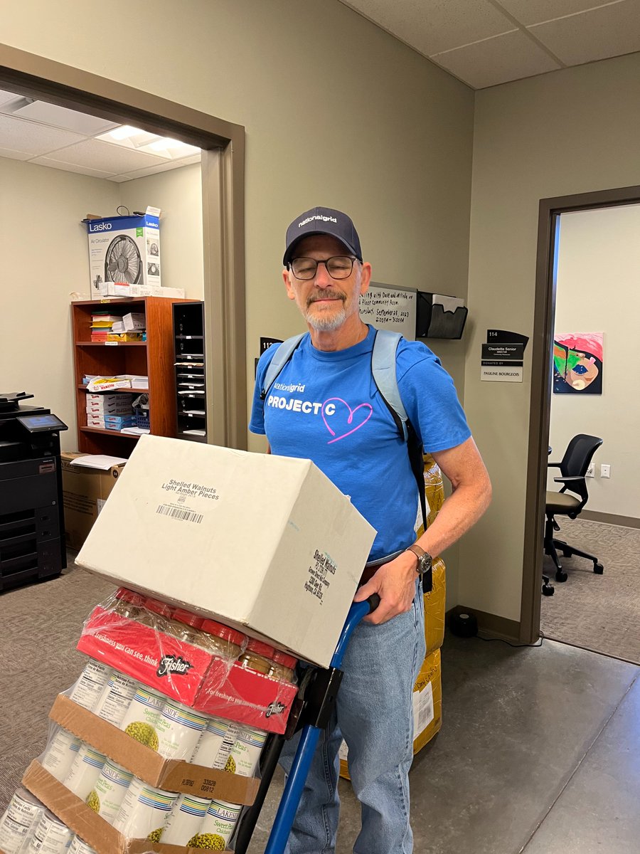 UnityHouseNY's tweet photo. Thank you, @nationalgridNY for your teams' great help this week!  Whether it's sorting shampoo for shelter, or hauling boxes for pantry, we appreciate the great, local contributions of neighbors.  #NGProjectC #StandforC https://t.co/p1DfToQg2M
