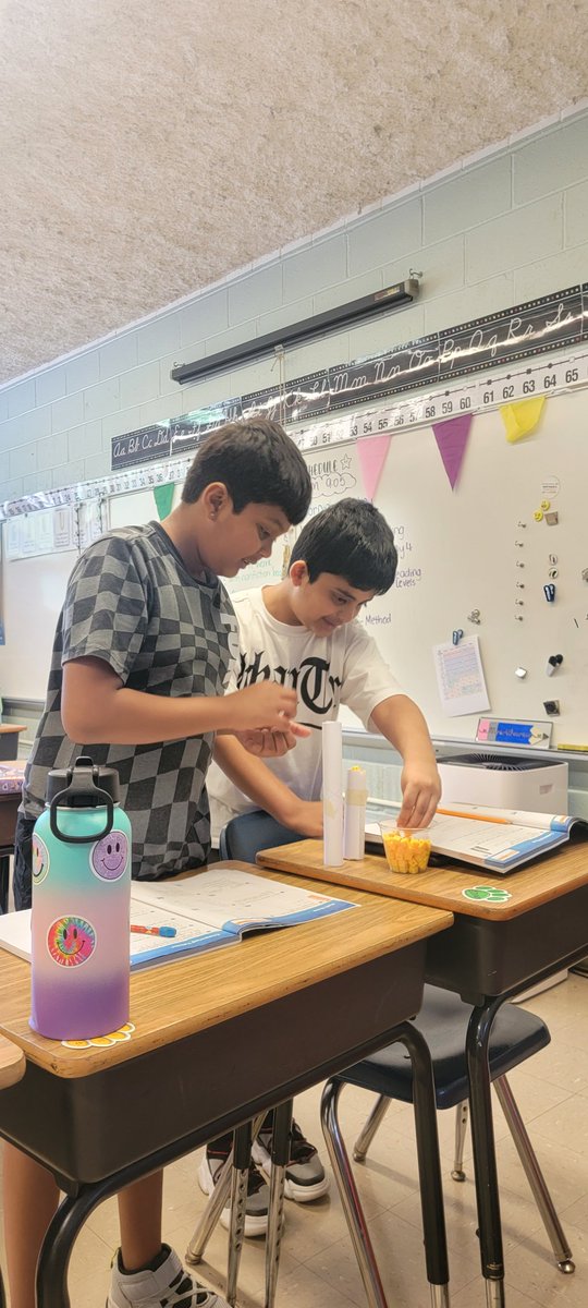 Investigating volume of cylinders #handsonlearning <a href="/menl/">Mario Edgar</a>
