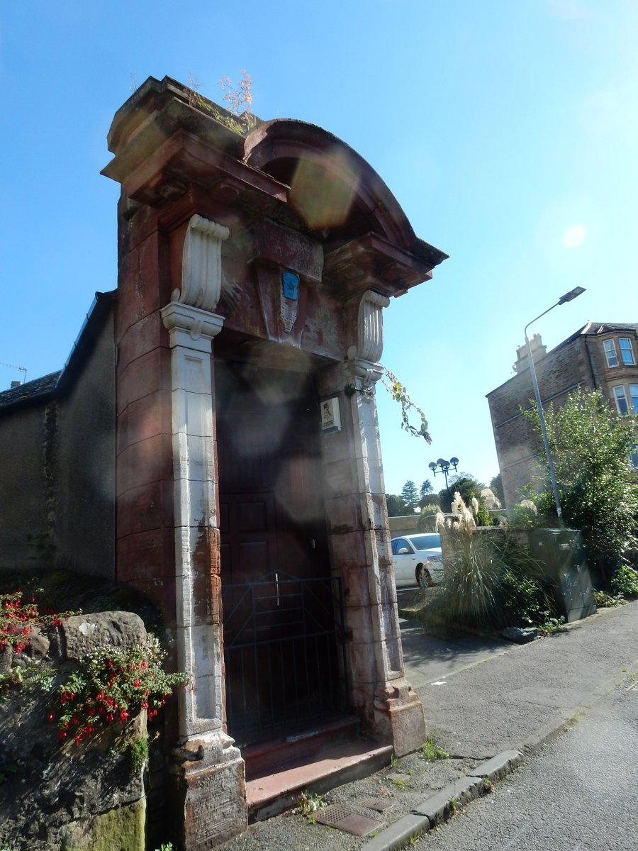 The back door of the Masonic Lodge in Rothsay on the Isle of Bute, an apparently triangular building and this is on the point, maybe reused from somewhere #AdoorableThursday  I got distracted by ice cream and neglected to find the front of the buildling