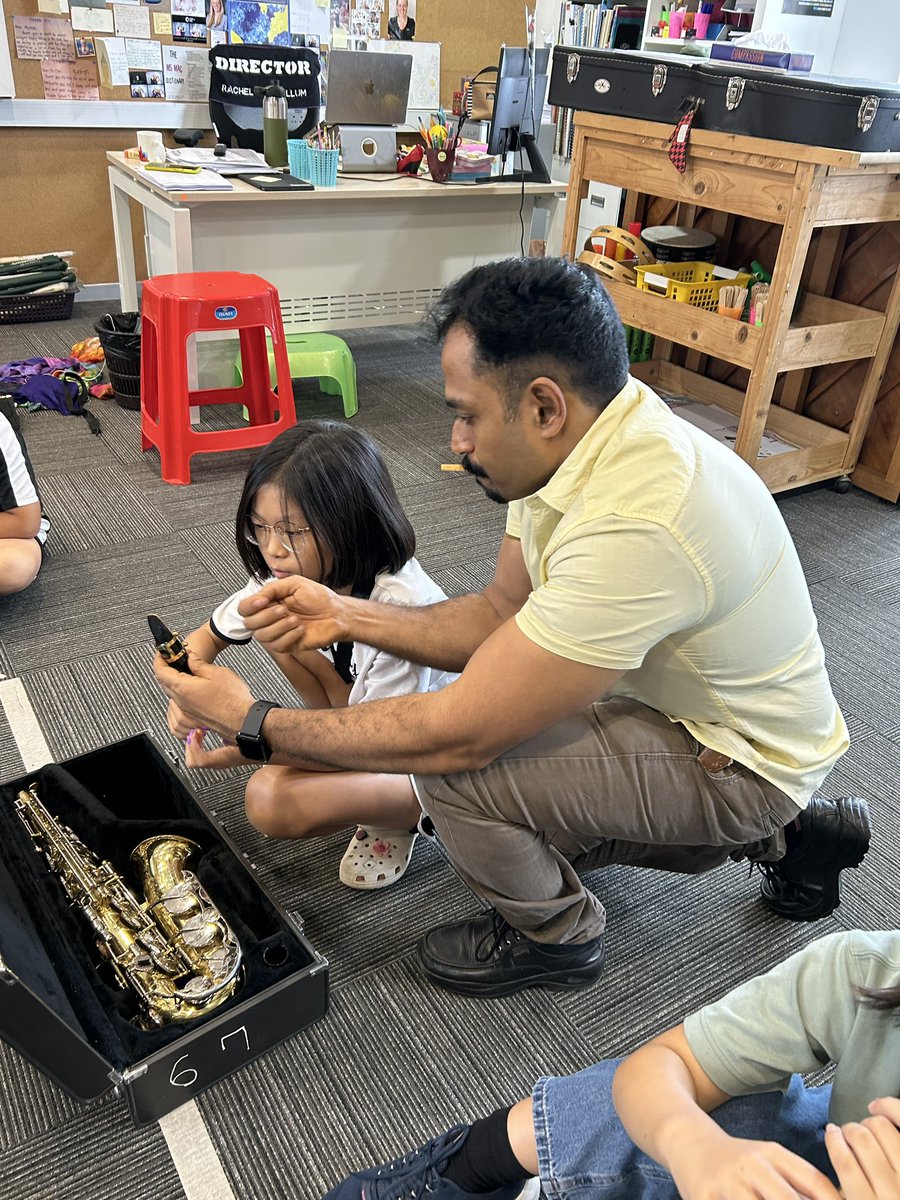 AISCElementary's tweet photo. The #AISCElementary instrumental program started this week. There were smiles ear to ear as the students learned how to put together and clean the flute, clarinet, or saxophone. #AISCMusic https://t.co/RDM8RhSB4h