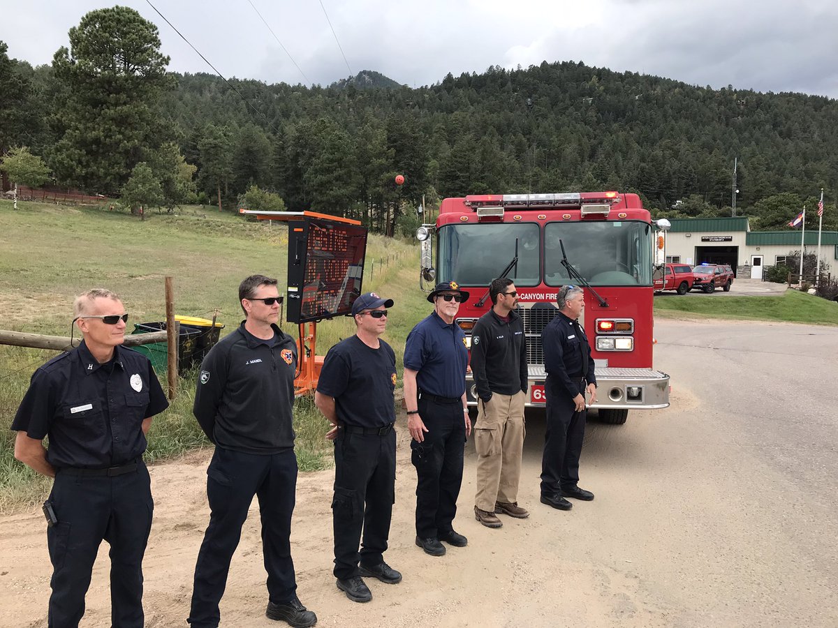 The firefighters, EMTs and paramedics of <a href="/ICFPD/">ICFPD</a> stand to honor the procession of Major Tobin J. Lewis of Morrison who died serving his country
