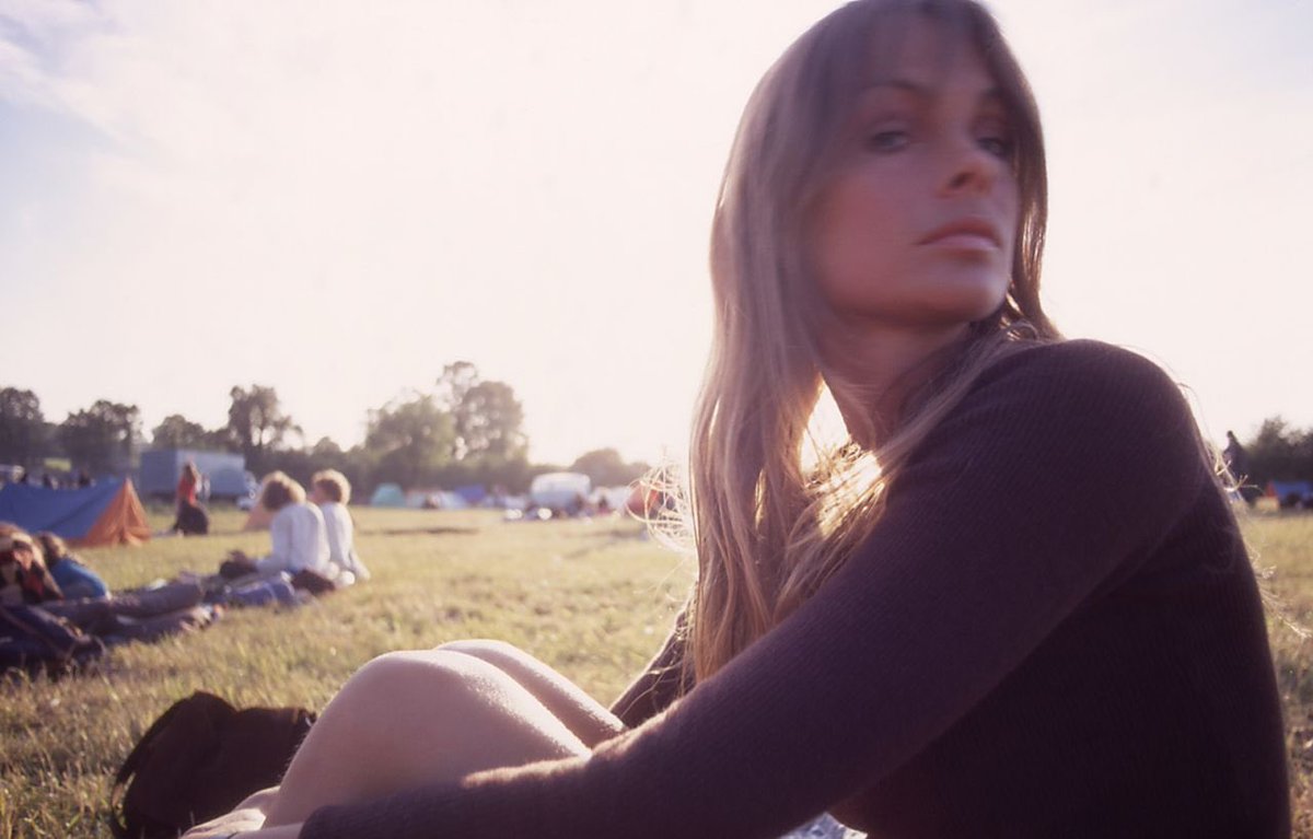 candid capture of model of the moment Jean Shrimpton at Glastonbury in 1971, photographed by Misso.