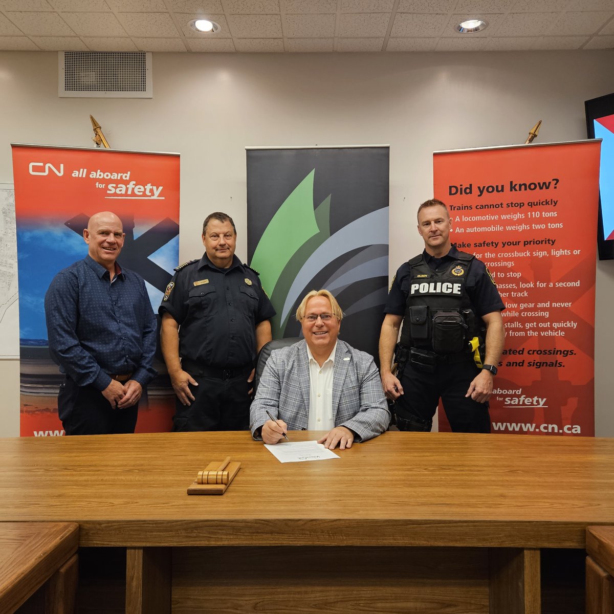 Mayor <a href="/GaryPhilipchuk/">Gary Philipchuk</a> signed a proclamation at City Hall today recognizing the week of September 18-24 as “Rail Safety Week” in Warman. Mayor Philipchuk was joined by Cst. Shayn Olsen from <a href="/CNRailway/">Canadian National</a> as well as <a href="/WarmanFire/">Warman Fire Rescue</a>  Chief Russ Austin &amp; City Manager Bob Smith.

(cont.)