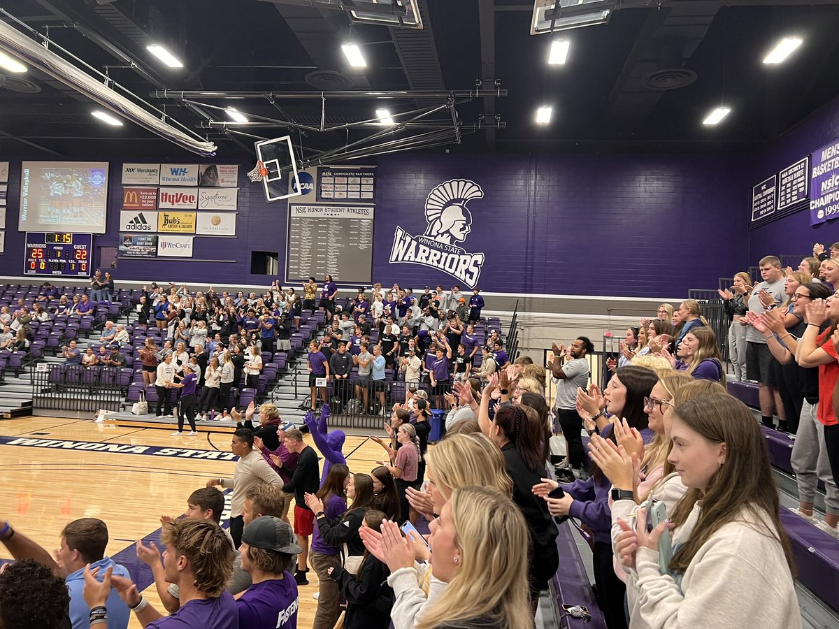Coach_Bergy's tweet photo. Great energy on and off the floor tonight!  Love seeing so many other @WinonaStateATH student-athletes supporting our @WinonaStateVB 

1-0. https://t.co/0Tvhw9AqjU