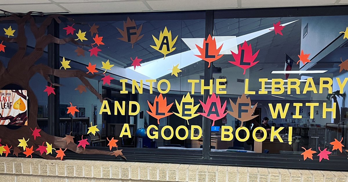 busy_librarian's tweet image. Our newest window! FALL into the library and LEAF with a good book! @KyleES_library @kespanthers #kyleesrocks