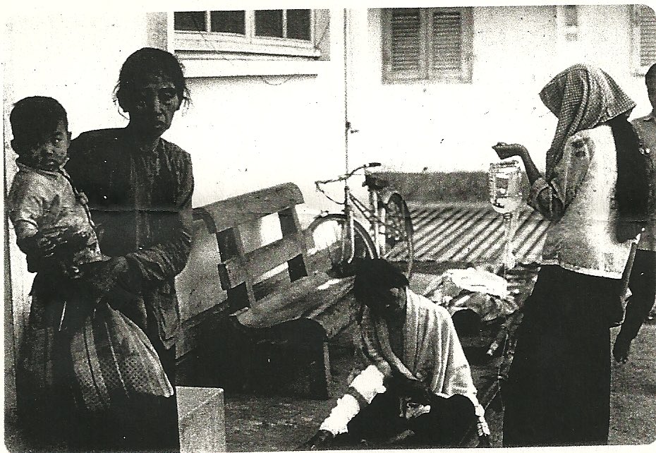 JMcNutty23's tweet photo. Had dinner with my pop tonight (thus the Vietnam pics). He took this at a civilian aid station he was WORKING AT IN ‘68. Tonight he said “the entire Vietnam war can be summed up by looking at the face of the woman on the left, holding a child”. #VietnamWar #MACV https://t.co/sOf1RKFcUD