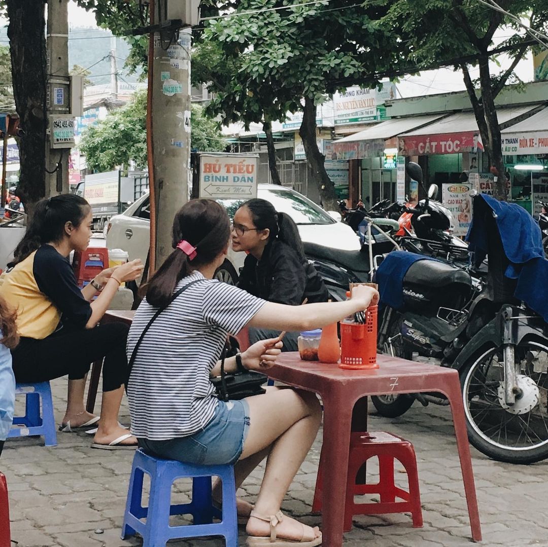 khyatimaloo's tweet photo. A #TravelTale from #Saigon 2014 🇻🇳
Amidst the scorching heat and humidity, I sought refuge at a humble street-side shop, a true lesson in budget travel. 5-7 tiny plastic stools scattered along the sidewalk, a couple of tourists engrossed in their Lonely Planet guidebooks—a classic scene from #Vietnam.
The line of stools led to what seemed like a crack in the wall. Inside, a modest kitchen operated by a lady.
"Welcome to Vietnam. India? #ShahrukhKhan fan!?" the lady beamed, revealing her betel-stained teeth. Whether it was the aroma of coffee or the SRK reference, I found myself occupying a plastic stool at her "cafe."
I ordered a cold coffee, and within moments, she placed a glass tumbler on the table, crowned with a covered tin cup. Then, she hurried back into her kitchen.
As I watched, the coffee dripped at an agonizingly slow pace. Naturally, I struck up a conversation with the person next to me. About 5 minutes later, the lady returned, removed the lid, flipped it upside down on the table, and placed the filter chamber on top.
And there it was, Ca Phe—a sinful layer of #coffee resting atop a creamy sheet of condensed milk. A couple of ice cubes and a thorough stir later, I took my first sip of what I now call "Ambrosia."
"Coffee good?" the shopkeeper inquired as I handed her a (just) 1 USD. I wasn't quite sure how to convey that I had never tasted anything quite as unique. I had no intention of rushing through this classic, slow-dripped coffee.
It was a far cry from the usual routine of dashing into a cafe, glancing up only when the barista calls your name, receiving your order, and hastily downing a syrupy concoction that's loosely associated with coffee.
In response to her query, all I could muster was, "Coffee, great! @iamsrk should try it. He'd love it."
Have you been to Vietnam and tried #Vietnamese coffee?