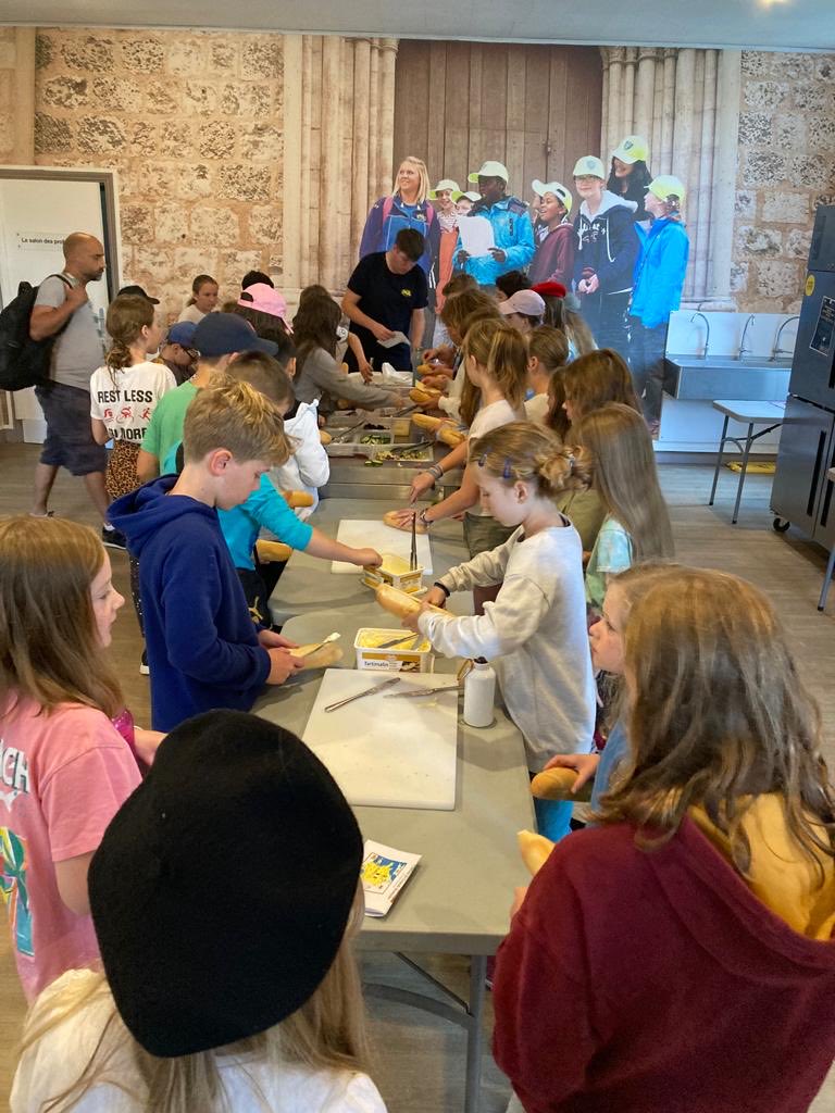 The children making their packed lunch for the journey home. Thank you France for a wonderful adventure.