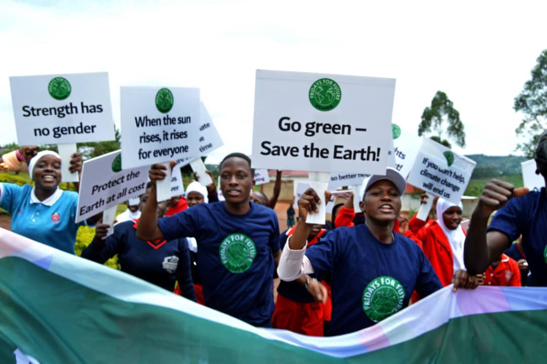 NakabuyeHildaF's tweet photo. What do we want? 
- CLIMATE JUSTICE 

When do we want it? 
- NOW. 

#StopEACOP 
#NoFossilFuels #GlobalClimateStrike 
#FridaysForFuture https://t.co/d61LXpx5hr